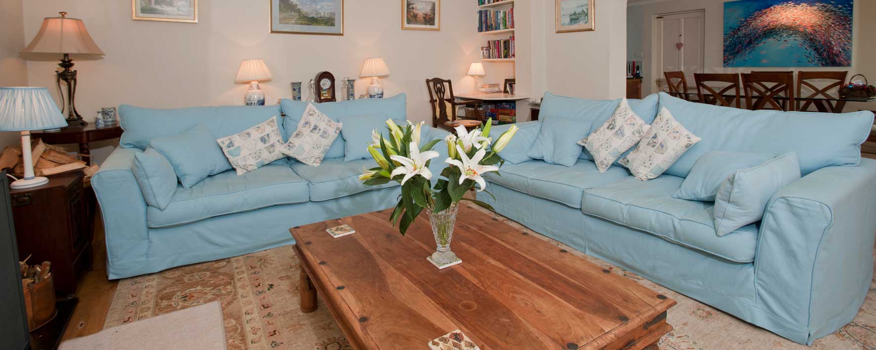 Warm and cosy lounge with woodburner